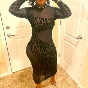 Black dress peek a boo animal print accent